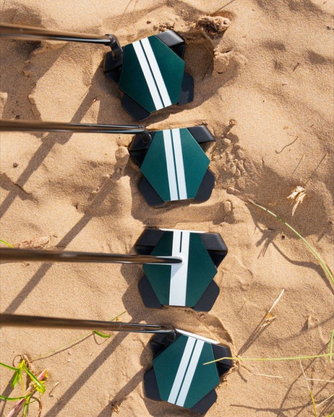 Odyssey TRTL putters from above with two parallel alignment lines